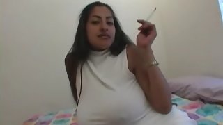 Sexy girl showing her big boobs an licking her boobs